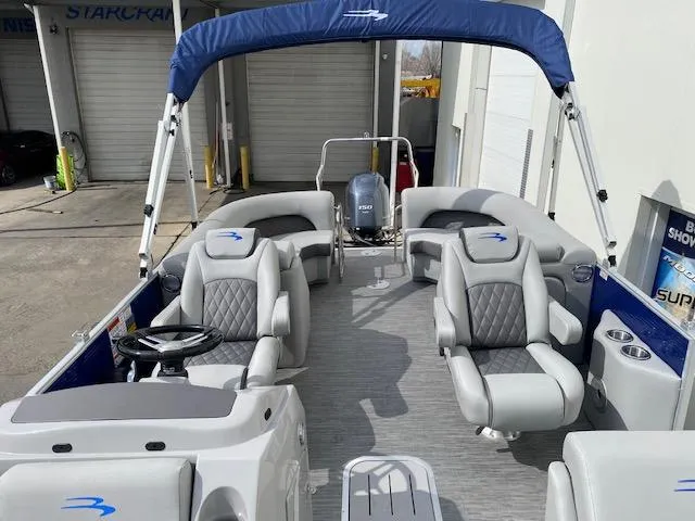 Slide: The Image of 2023 Bennington 22LFB pontoon boat with spacious seating and modern design. - 8