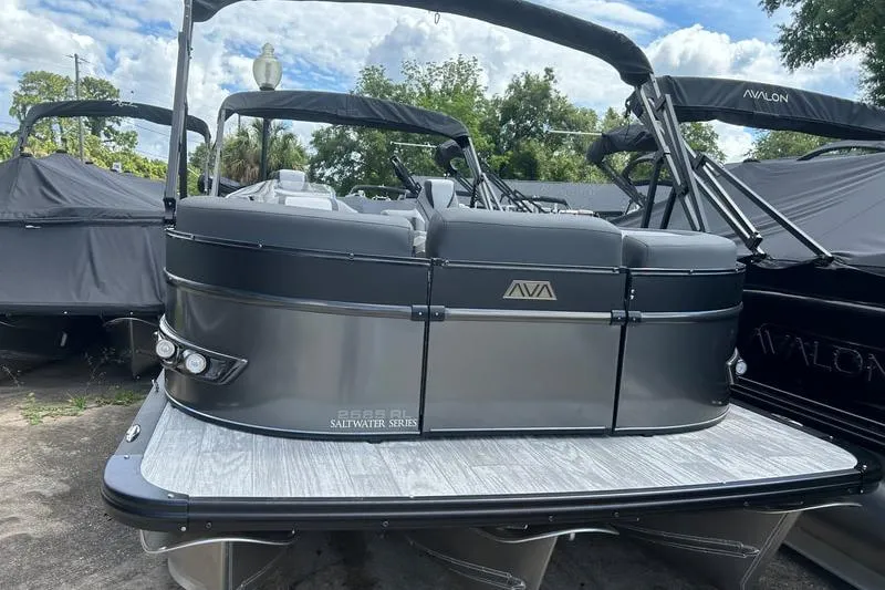 The Image of 2024 Avalon Catalina Platinum Rear Lounger pontoon boat, sleek design, parked outdoors. - 0