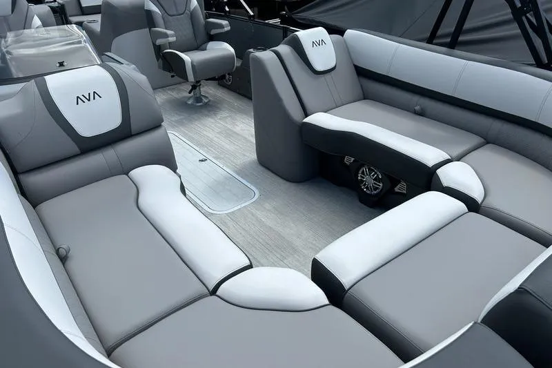 Slide: The Image of 2024 Avalon Catalina Platinum Rear Lounger interior with luxurious gray seating and modern design. - 4