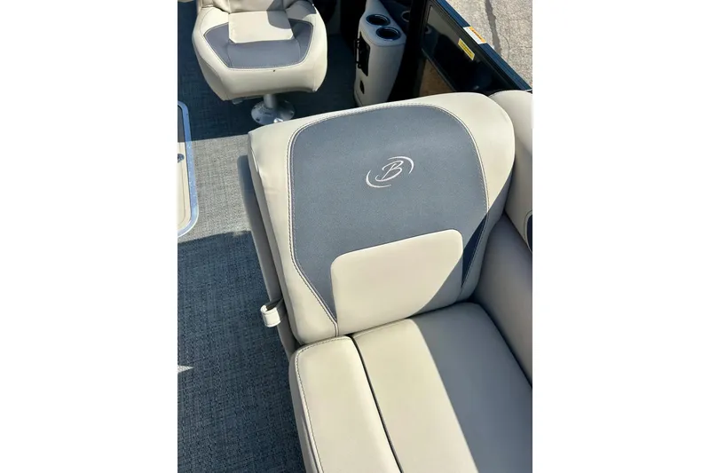 Slide: The Image of 2024 Barletta ARIA 22QC boat interior with gray and beige seating. - 19