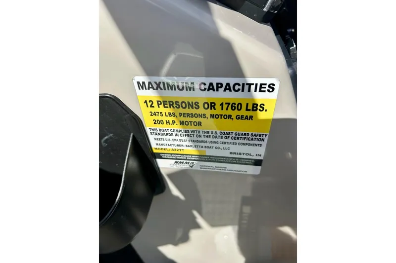 Slide: The Image of 2024 Barletta ARIA 22QC capacity label, 12 persons or 1760 lbs, 200 HP motor. - 26