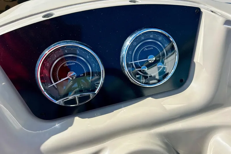 Slide: The Image of Dashboard of 2024 Barletta ARIA 22QC with RPM and MPH gauges. - 27