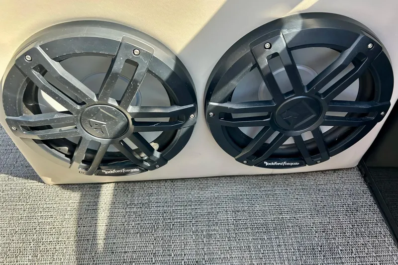 Slide: The Image of Dual Rockford Fosgate speakers on 2024 Barletta ARIA 22QC boat, enhancing audio experience. - 34