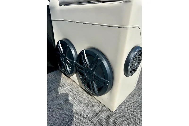 Slide: The Image of 2024 Barletta ARIA 22QC boat speakers on beige panel, showcasing premium audio system. - 36