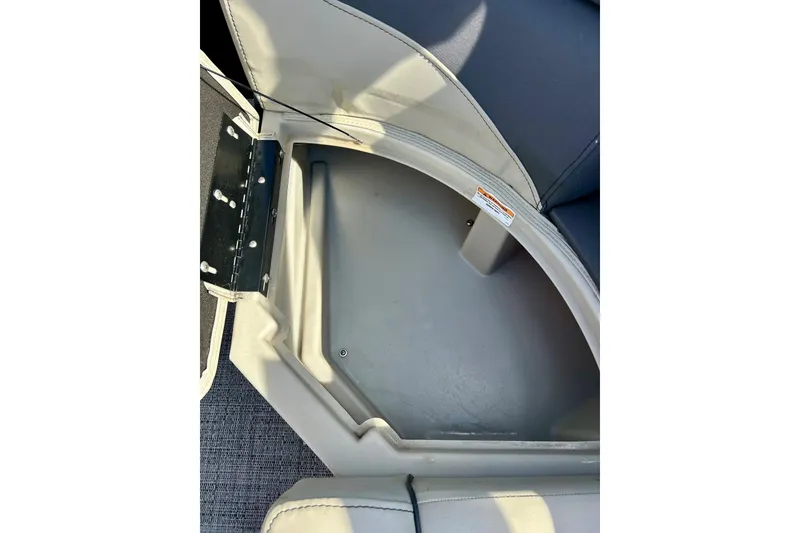Slide: The Image of Open storage compartment in 2024 Barletta ARIA 22QC boat, featuring spacious interior. - 40