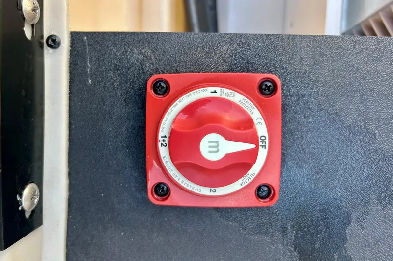 Slide: The Image of Red battery switch on 2024 Barletta ARIA 22QC boat dashboard. - 46