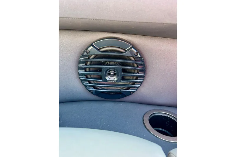 Slide: The Image of Speaker on 2024 Barletta ARIA 22QC boat interior, featuring Hertz audio system. - 51
