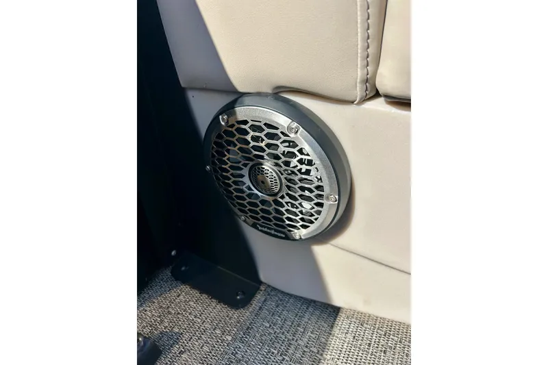 Slide: The Image of 2024 Barletta ARIA 22QC boat speaker with stylish grille on beige interior. - 56
