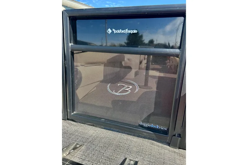 Slide: The Image of 2024 Barletta ARIA 22QC boat with Rockford Fosgate speaker and doggie dock view feature. - 8