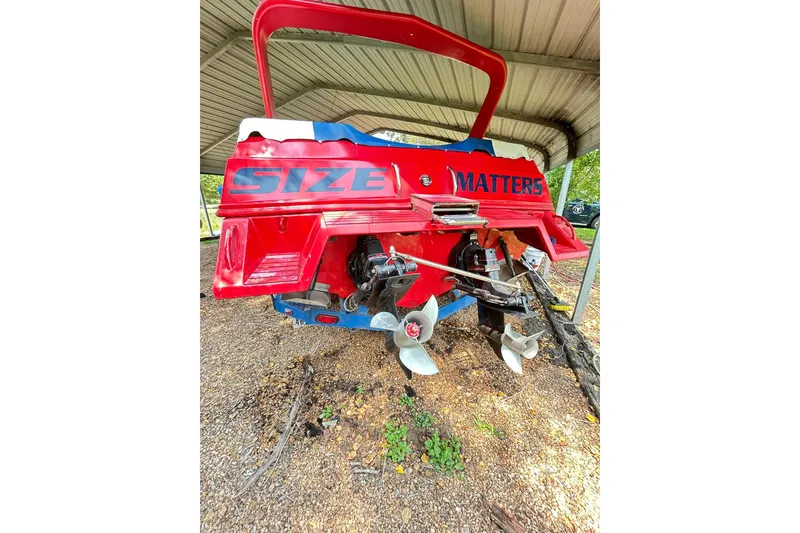 Slide: The Image of 1987 Chris-Craft 312 Stinger boat with bold "Size Matters" text on the stern. - 24