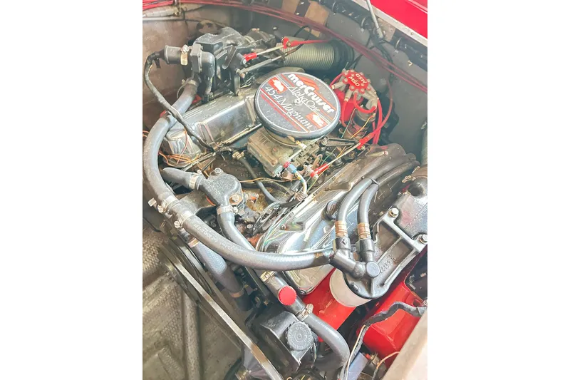 Slide: The Image of 1987 Chris-Craft 312 Stinger engine compartment with visible MerCruiser components. - 35