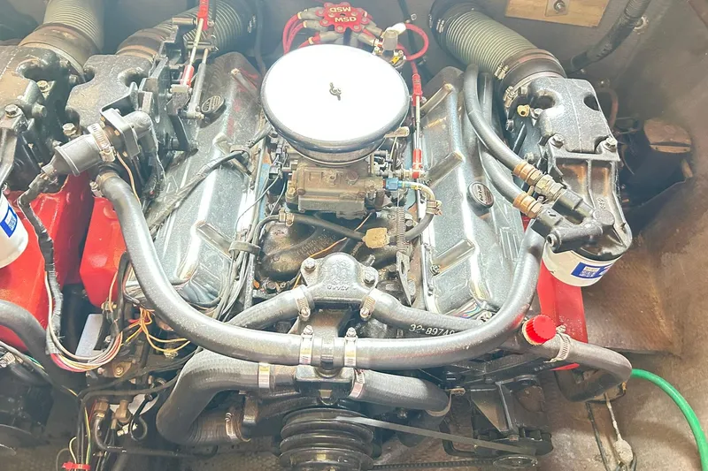 Slide: The Image of 1987 Chris-Craft 312 Stinger engine with visible components and wiring. - 37