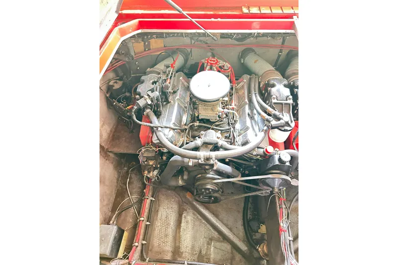Slide: The Image of 1987 Chris-Craft 312 Stinger engine compartment with visible components and wiring. - 39