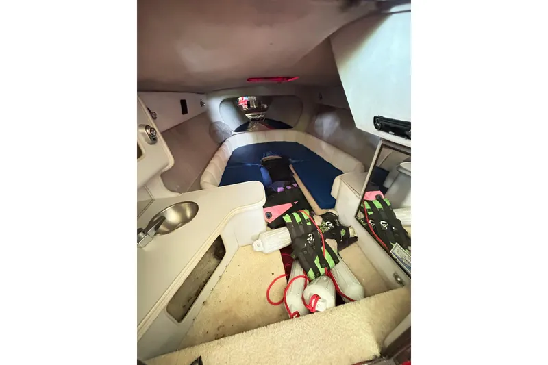 Slide: The Image of Interior of 1987 Chris-Craft 312 Stinger boat with seating and storage. - 5