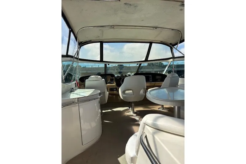 Slide: The Image of Interior view of 2004 Carver 466 Motor Yacht, featuring carpeted steps and sleek design. - 19