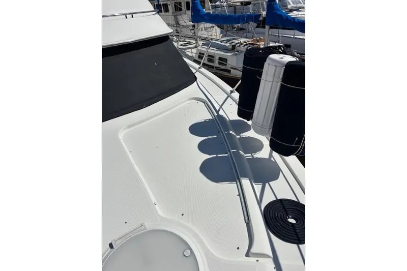 Slide: The Image of Bow of 2004 Carver 466 Motor Yacht with anchor and winch system. - 32