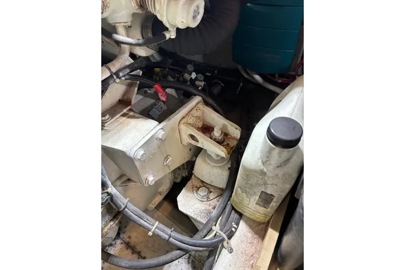 Slide: The Image of Engine room of 2004 Carver 466 Motor Yacht with visible wiring and components. - 81