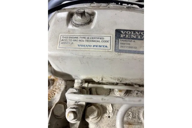 Slide: The Image of Volvo Penta engine label on 2004 Carver 466 Motor Yacht, model TAMD75P-A. - 84