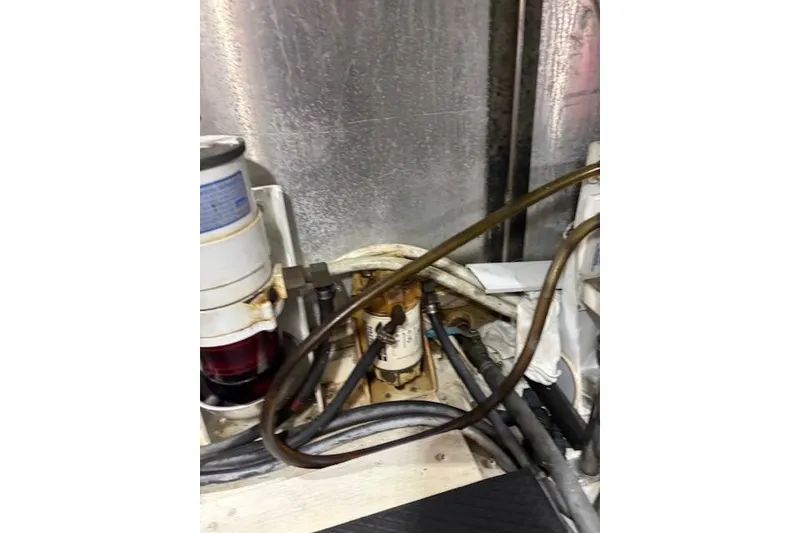 Slide: The Image of Engine room of 2004 Carver 466 Motor Yacht with Reverso oil change system. - 92