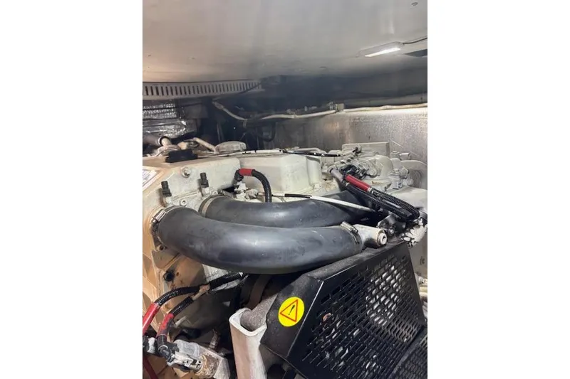 Slide: The Image of Volvo Penta engine in 2004 Carver 466 Motor Yacht, showcasing high performance. - 94