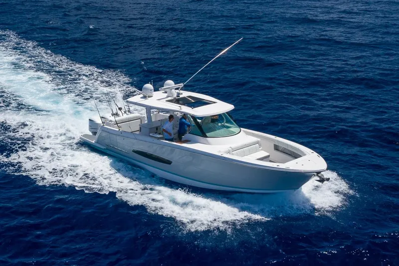 Slide: The Image of Manufacturer Provided Image: 2026 Regal 38 SAV cruising on open blue ocean waters. - 0