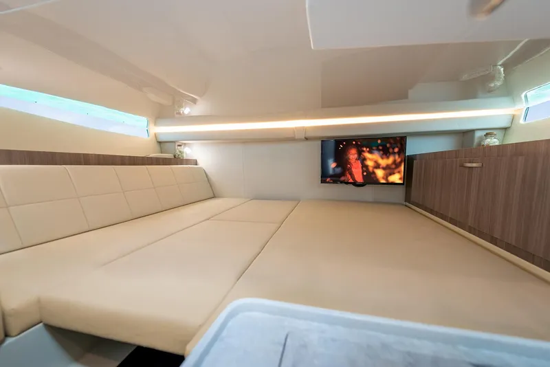 Slide: The Image of Manufacturer Provided Image: Luxurious interior of 2026 Regal 38 SAV yacht with modern amenities and cozy sleeping area. - 12