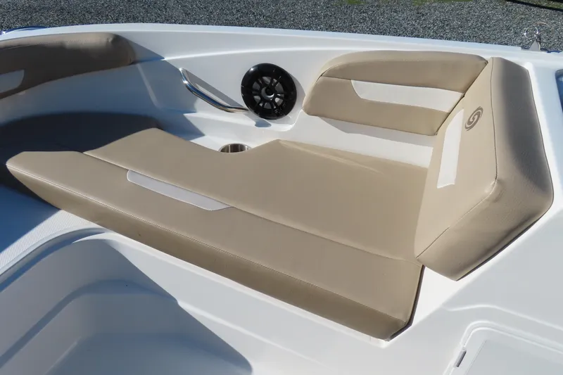 Slide: The Image of 2021 Hurricane SunDeck Sport 185 OB boat interior with beige seating and speaker. - 10