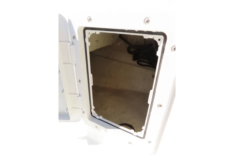 Slide: The Image of Open storage compartment on 2021 Hurricane SunDeck Sport 185 OB boat. - 16