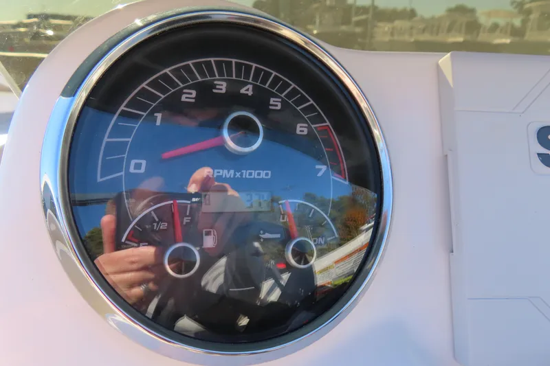 Slide: The Image of Close-up of 2021 Hurricane SunDeck Sport 185 OB tachometer and fuel gauge. - 18
