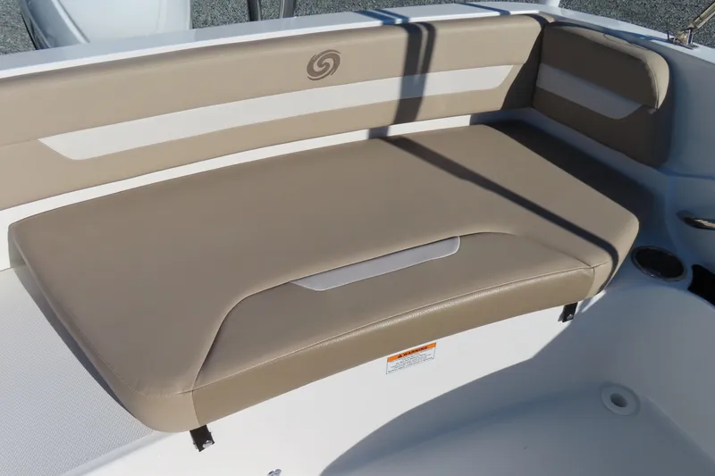 Slide: The Image of 2021 Hurricane SunDeck Sport 185 OB boat seat, beige upholstery, cup holder, and storage compartment. - 23