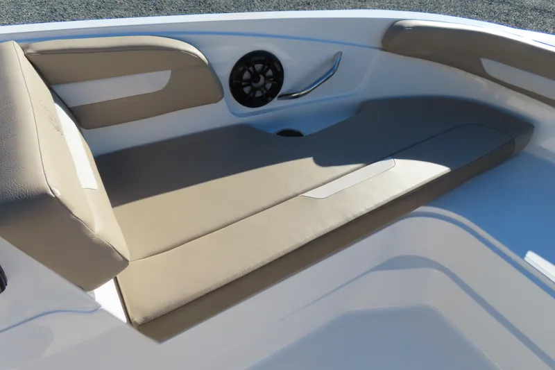 Slide: The Image of 2021 Hurricane SunDeck Sport 185 OB boat interior with beige seating and speaker. - 8