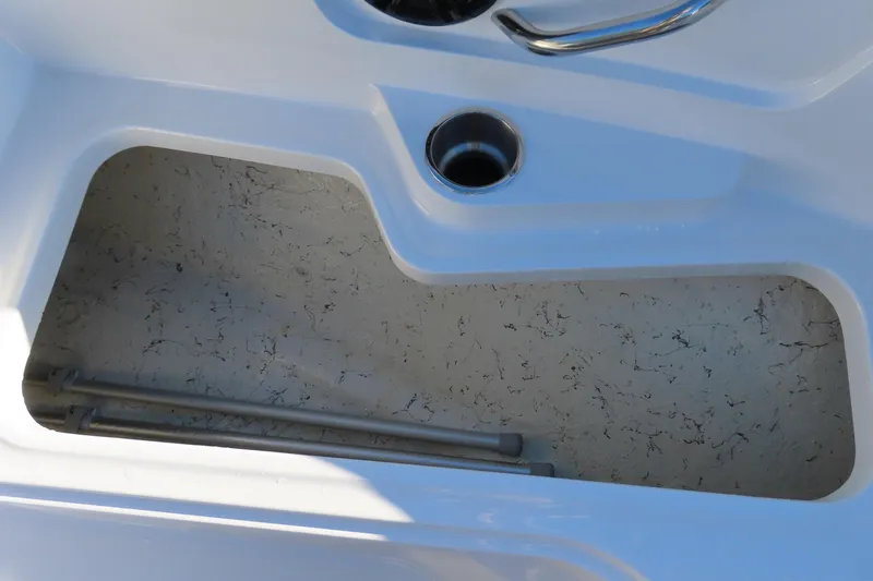 Slide: The Image of Storage compartment of 2021 Hurricane SunDeck Sport 185 OB boat, featuring a sleek design. - 9