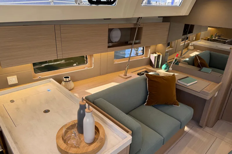 Slide: The Image of Modern interior of 2026 Beneteau Oceanis 47 yacht with elegant furnishings and natural light. - 11
