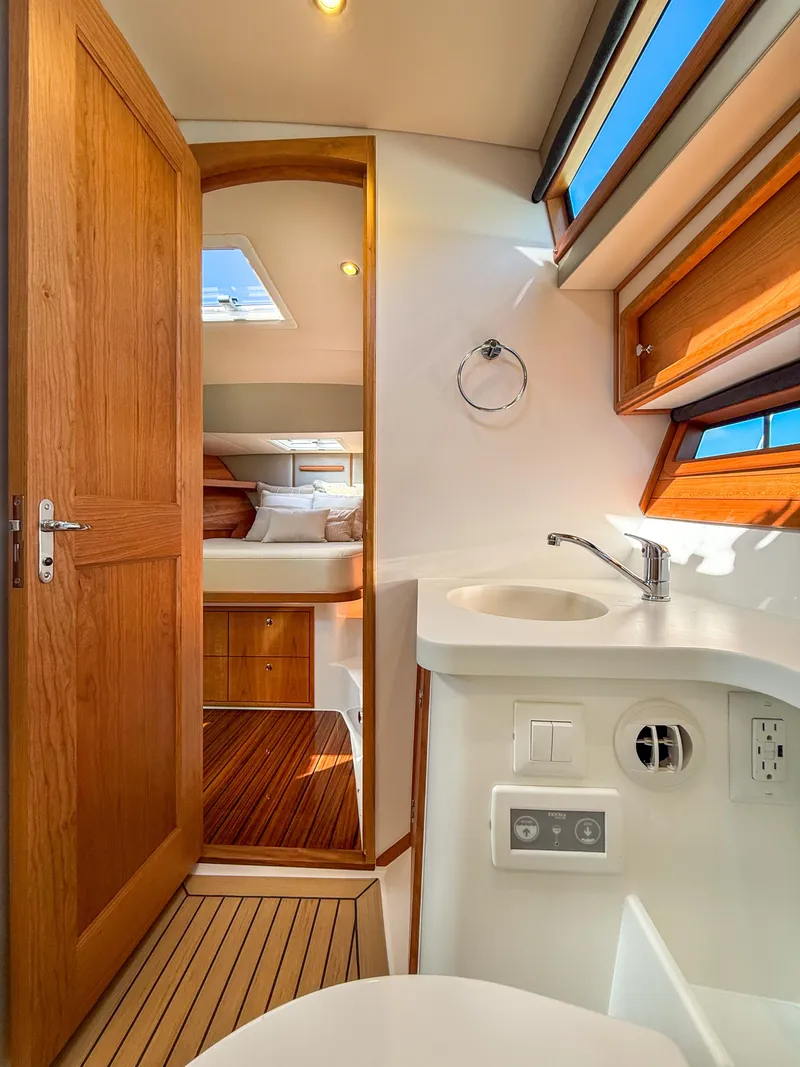Slide: The Image of Luxurious interior of 2026 MJM 47R yacht, featuring elegant wood finishes and modern amenities. - 16