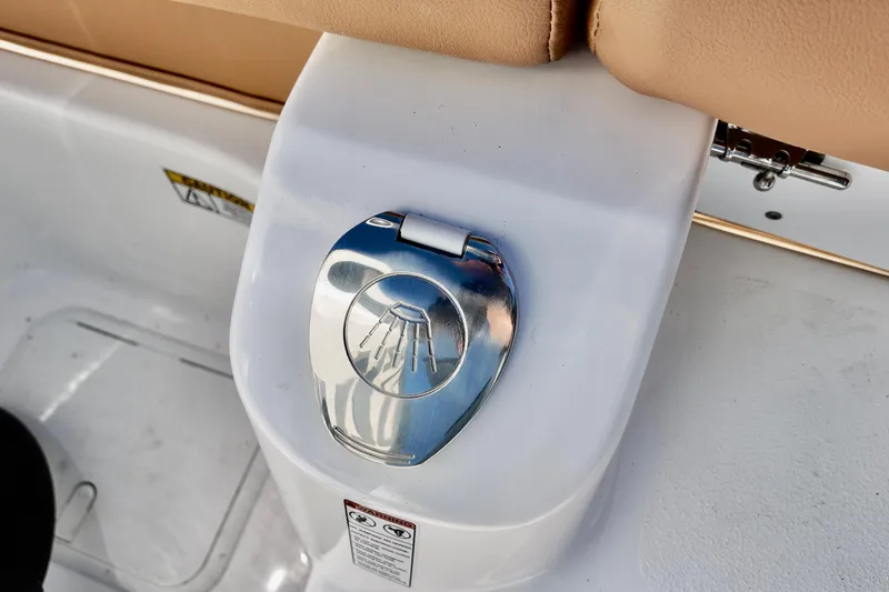 Slide: The Image of 2026 NauticStar 212 Legacy boat detail with chrome shower control. - 9