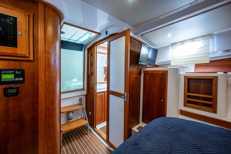 Slide: The Image of Interior of 2020 Back Cove 340 yacht with wood finishes and modern amenities. - 14