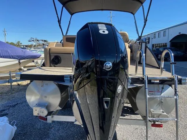 Slide: The Image of 2022 Barletta Cabrio C24UC pontoon boat with Mercury outboard motor. - 3