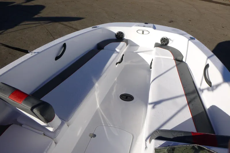 Slide: The Image of 2024 Tahoe T18 boat interior with sleek seating and modern design. - 17