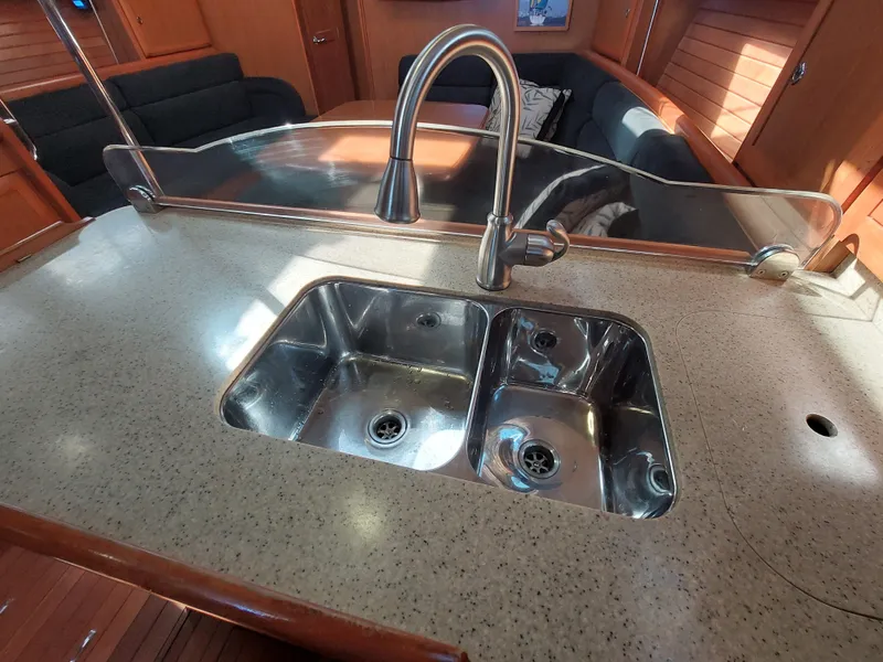 Slide: The Image of Stainless steel sink in 2009 Hunter 49 yacht kitchen interior. - 17