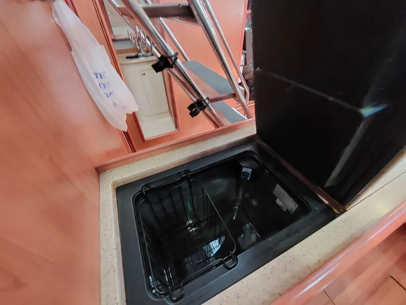 Slide: The Image of Hunter 49 yacht interior, 2009 model, featuring a built-in kitchen sink and countertop. - 21