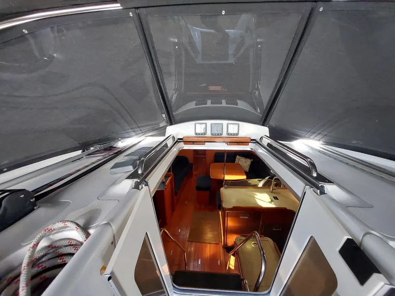 Slide: The Image of Interior view of 2009 Hunter 49 sailboat, showcasing cabin and seating area. - 45