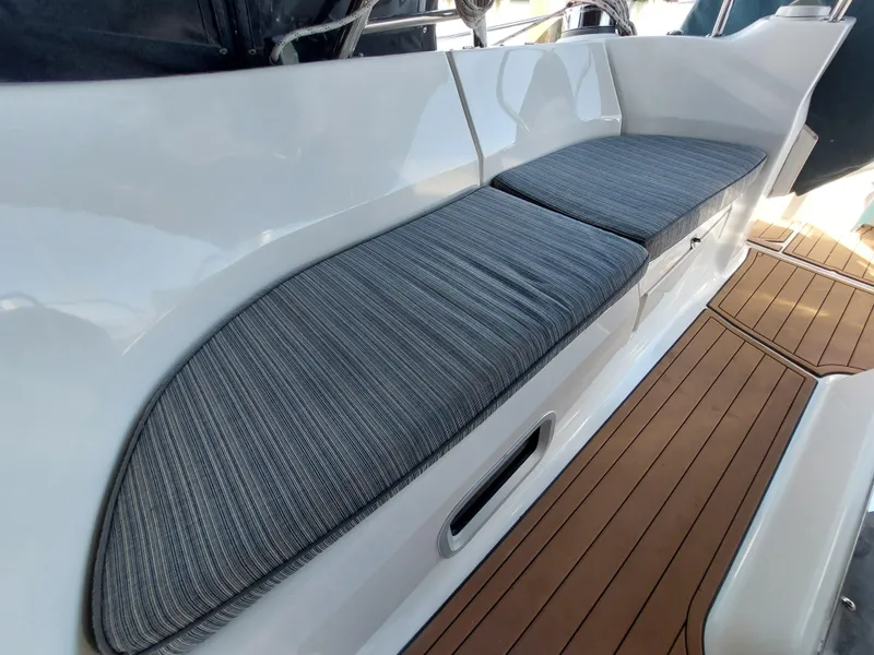 Slide: The Image of Hunter 49 yacht cockpit seating with gray cushions, 2009 model. - 48