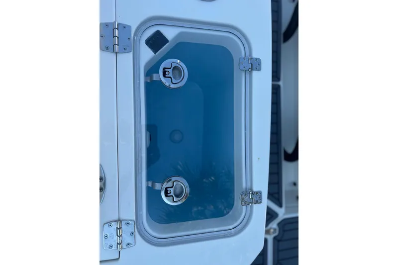 Slide: The Image of Livewell compartment on 2026 Cobia 285 Open Center Console boat. - 15