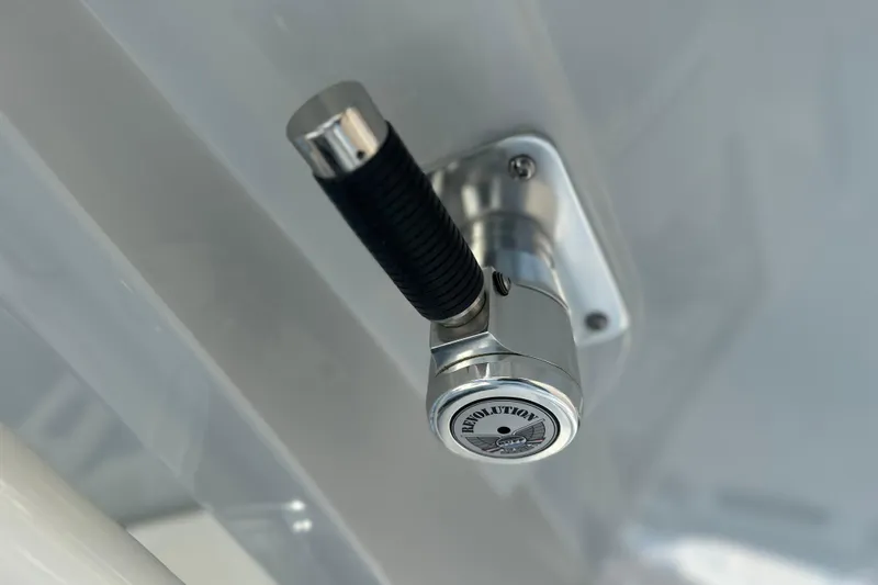 Slide: The Image of Close-up of a 2026 Cobia 285 Open Center Console boat handle. - 32