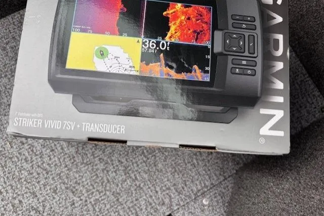 Slide: The Image of Garmin Striker Vivid 7SV transducer box on Alumacraft Voyageur 175 Sport, 2024 model. - 7