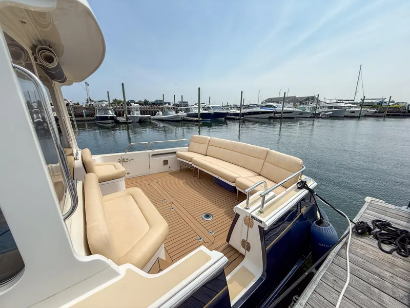 Slide: The Image of Luxurious interior of 2017 MJM 40z Downeast yacht with elegant seating and wooden accents. - 18