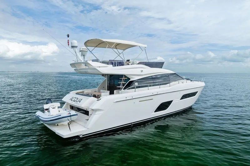 Slide: The Image of Aerial view of 2018 Ferretti Yachts 550 cruising on green water. - 11