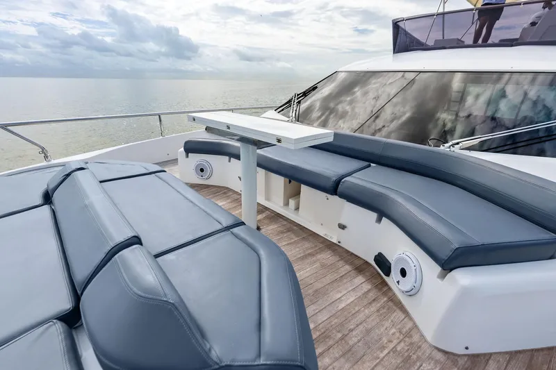 Slide: The Image of Luxurious interior of 2018 Ferretti Yachts 550, featuring elegant wood finishes and cozy cabin. - 38