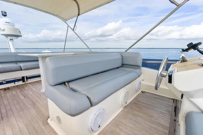 Slide: The Image of Interior cabin of 2018 Ferretti Yachts 550 with bed and TV display. - 50