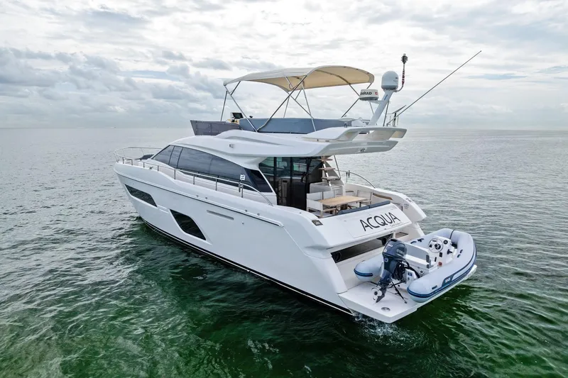 Slide: The Image of 2018 Ferretti Yachts 550 cruising on open water, featuring sleek design and luxury amenities. - 12